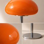 Lampe de table : abat-jour orange brillant en dôme, pied chromé et socle rond