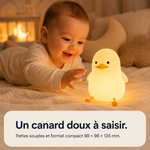 Veilleuse canard ronde, lumière chaude, caneton avec bec orange et pattes mobiles.