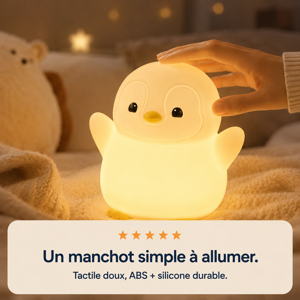 Veilleuse manchot lumineuse sur tissu, coque blanche, bec jaune, forme arrondie.
