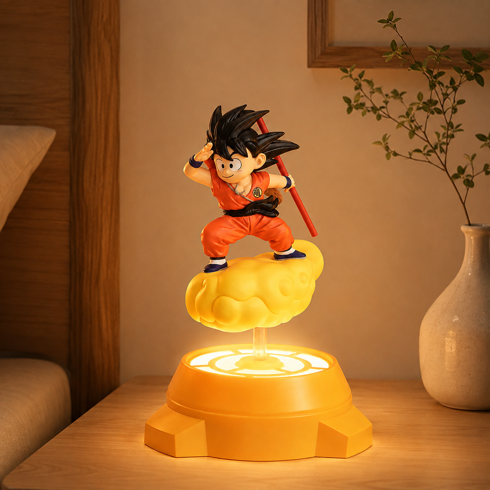 Figurine lumineuse Goku sur nuage jaune, lumière allumée, base orange à motif.