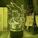 Lampe LED 3D Goku aux cheveux hérissés, lueur verte, socle noir.