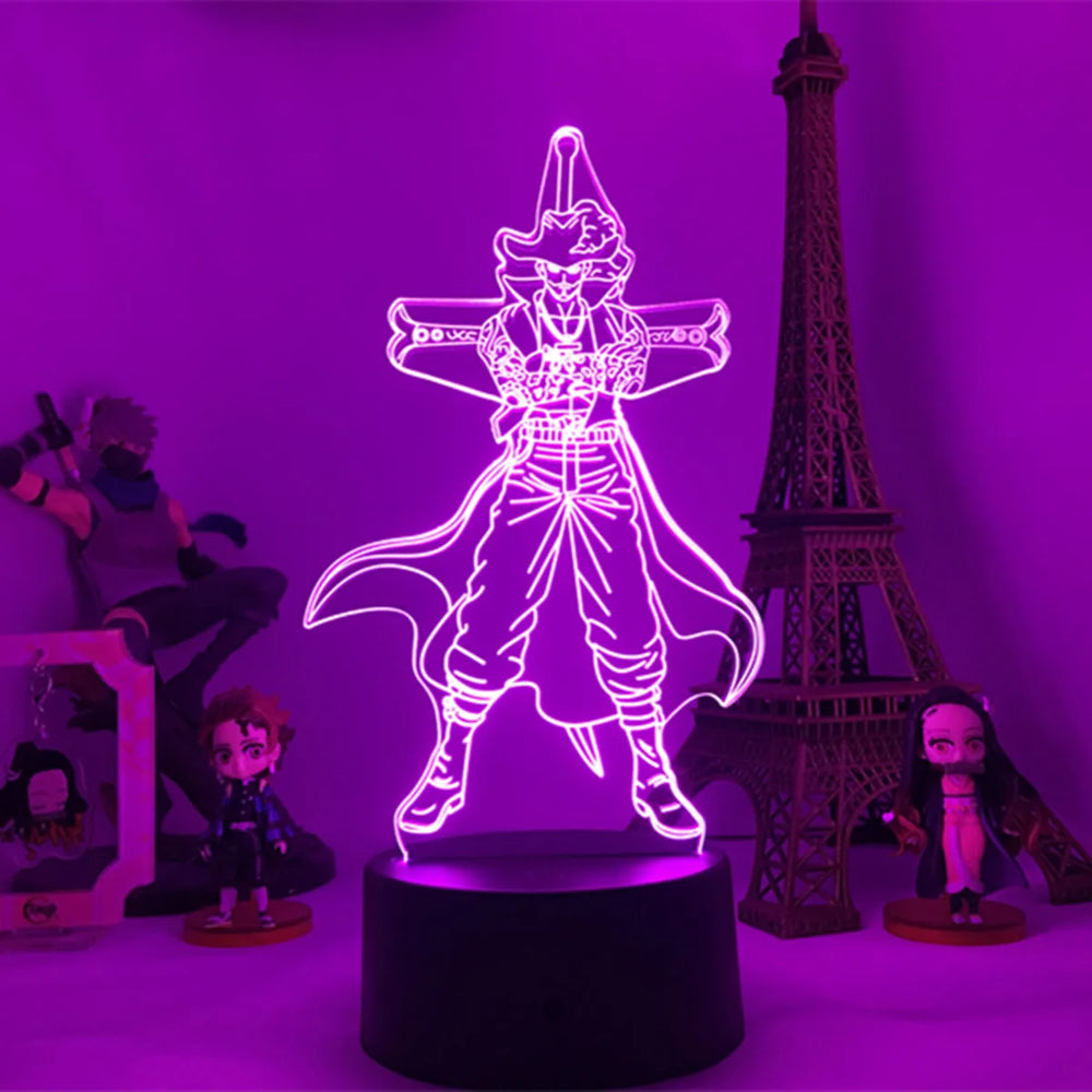 Lampe LED 3D personnage en lignes roses, marquage «ONE PIECE», socle noir.