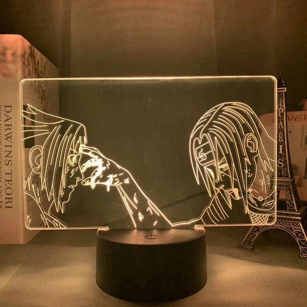 Veilleuse LED 3D manga sur socle noir, deux personnages en vis-à-vis, contours dorés.