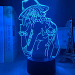 Lampe LED 3D motif de pirate en lignes bleues, socle noir cylindrique.