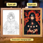 Cadre lumineux : esquisse monochrome et version colorée, ninja à cape noire