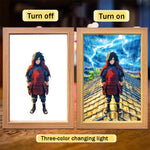 Cadre lumineux avec personnage ninja tenue rouge et noir, lumière bleue