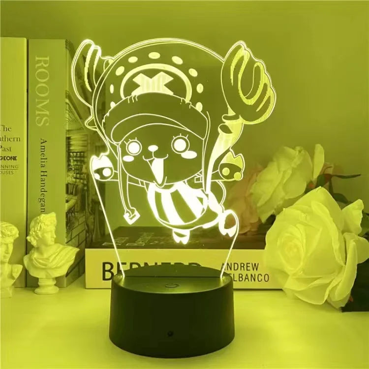Lampe LED 3D à motif de pirate, lumière blanche, socle noir cylindrique.